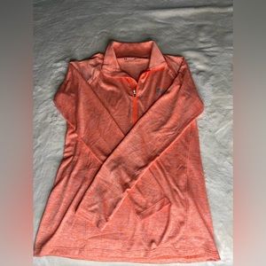Bright orange under armor pull over